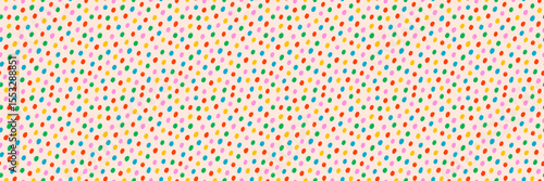 Seamless multicolor dot pattern background on cream. Confetti polka dot vecto...