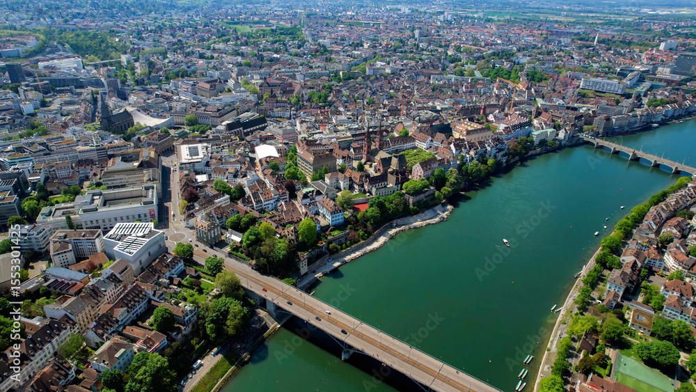 Fototapeta premium An Panoramic aerial of the old town of the city Basel in Switzerland on a sunny day in summer 