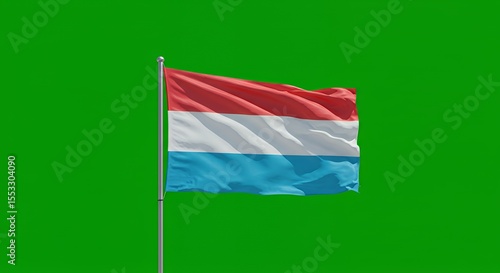 Luxembourg's vibrant flag billows proudly against a bright green backdrop.