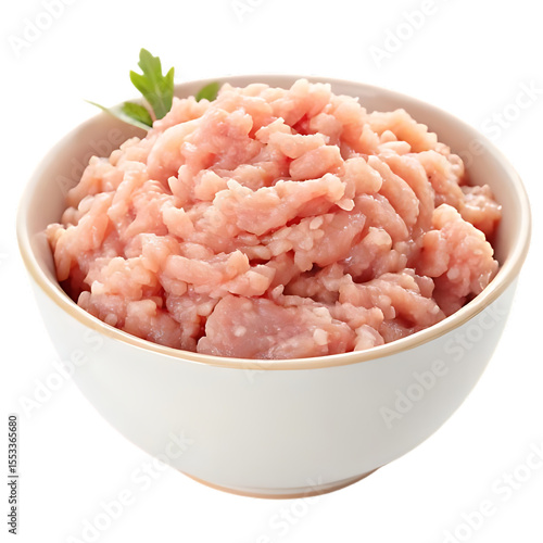 Minced chicken meat in a bowl, raw, showing texture clearly, isolated on a white surface.