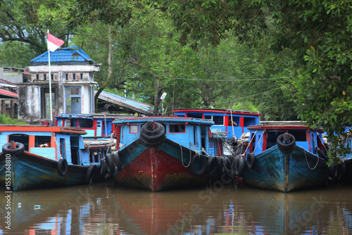 Foto canal boat in indonesia