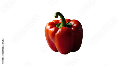 Vibrant red bell pepper with green stem isolated on black background
