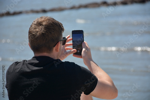 young man using cell phone