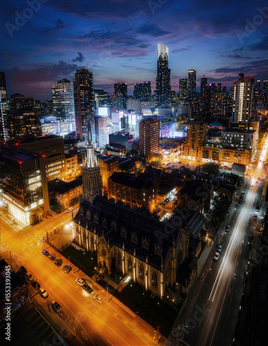 Wallpaper Mural Toronto Downtown Skyline at Night with Historic Church and Light Trails Torontodigital.ca