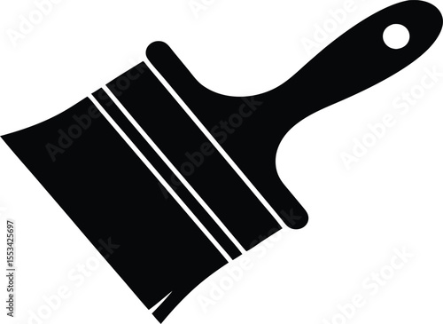 A black paint brush with a hole on its handle rests against white