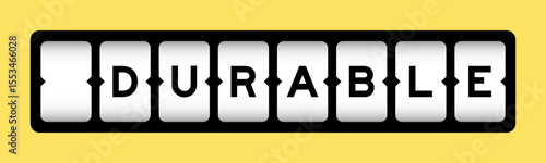 Black color in word durable on slot banner with yellow color background