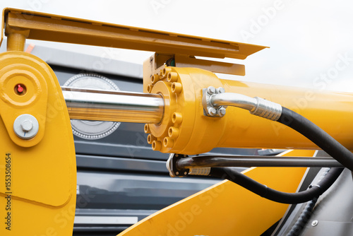 Closeup of hydraulic cylinder. Selective focus.