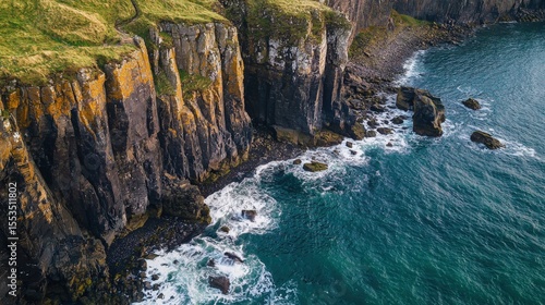 Rugged Coastal Cliffs & Ocean, Drone

High-angle drone shot shows rugged coastal cliffs with green tops, crashing waves, and clear blue ocean below.