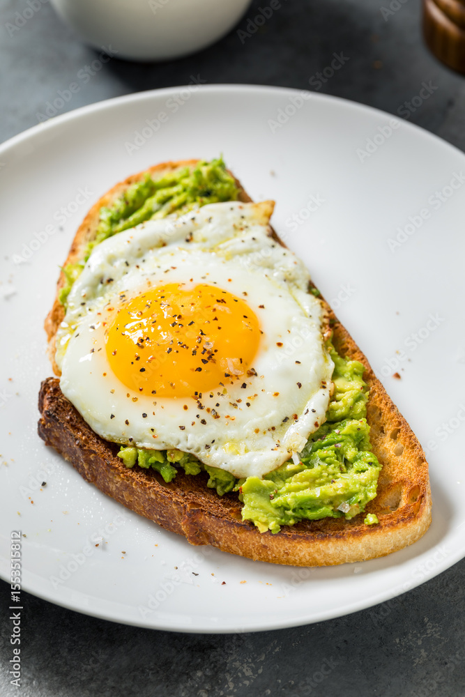 Healthy Homemade Avocado Toast with Over Easy Egg Healthy Homemade Avocado Toast with Over Easy Egg