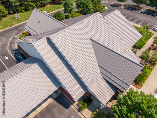 Sunny Mid Day Drone Images of Standing Seam Metal Roof on a Commercial Building