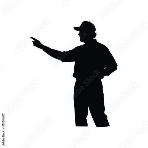 Silhouette of a man wearing a cap and pointing his finger