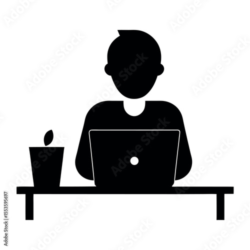  an icon representing a person working at a desk with a laptop. 