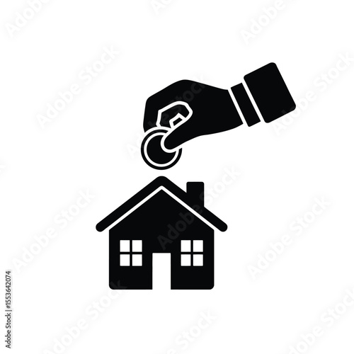 Hand dropping coin into house icon representing saving for a home or mortgage payment