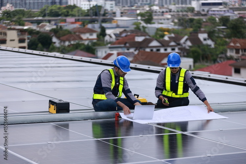 Professional engineer team check new solar roof project , green and renewable energy supply for industrial HVAC system, Heating Ventilation and Air-conditioning 