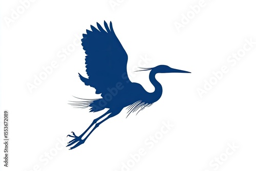 Silhouette of a heron in flight.