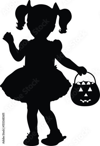 Silhouette of a young girl dressed up for Halloween trick or treating