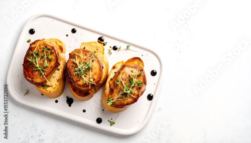 Seared Foie Gras Medallions On Toasted Brioche With Balsamic Glaze And Herbs