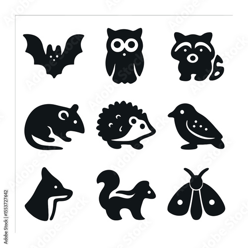 Nocturnal Animals Icons. Solid, filled icons set of nocturnal animals: bat, owl, raccoon, possum, hedgehog,