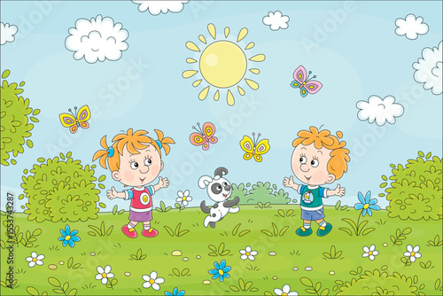 Happy little kids and their cheerful puppy playing with colorful butterflies flying around a flower green field on a sunny summer day, vector cartoon illustration
