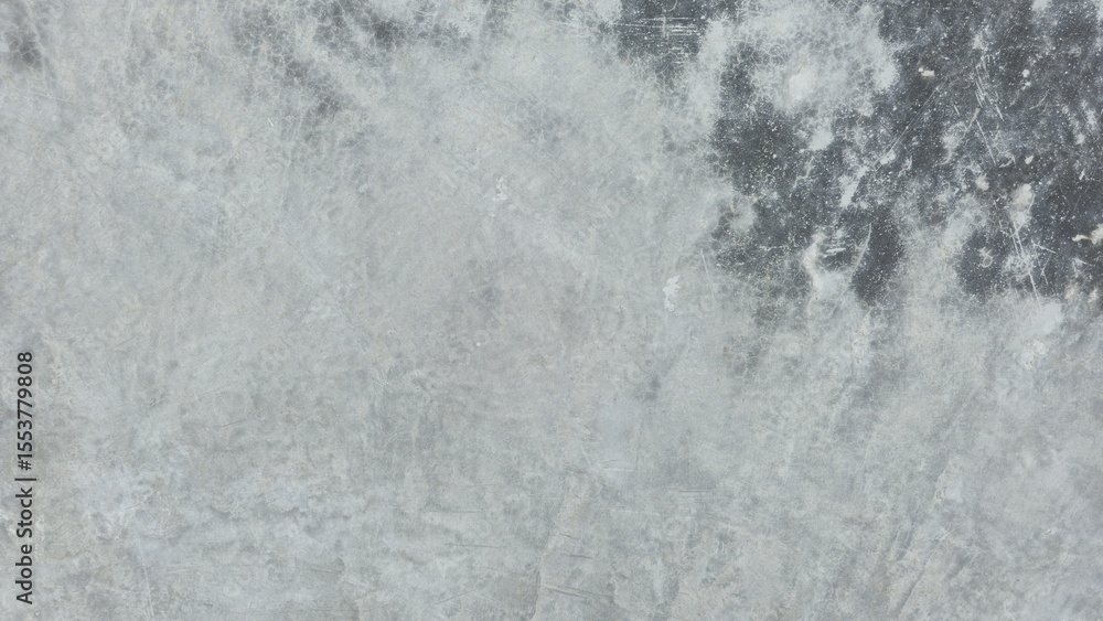 Obraz premium Gray concrete sidewalk with stains and uneven color. Roadside walkway. Texture and background image.