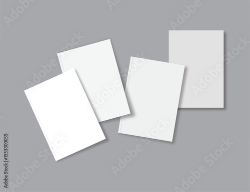 Minimalist top view of four blank books arranged on gray background, perfect for mockups, publishing, and editorial design concepts.