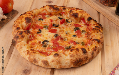 vegetarian pizza with olive, tomato, caper and cheese