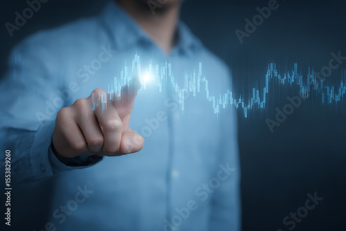 Businessman in Blue Shirt Interacting with Virtual Financial Data Chart – Touchscreen Technology Concept