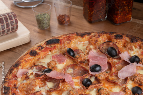 pizza with ham and olives