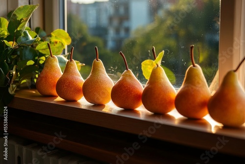 Fresh Pears Displayed on a Wooden Windowsill With Sunlight Glistening in the ...