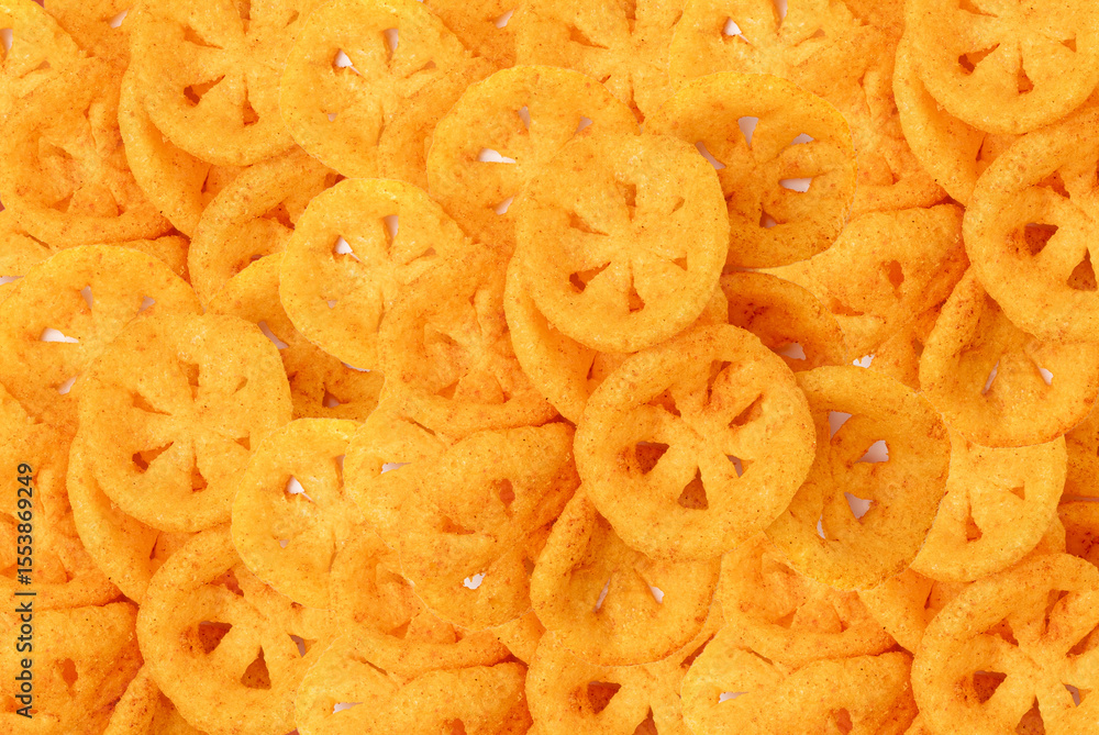 Obraz premium Corn puff snack pattern, crunchy cereal nosh pile, crispy yellow rice breakfast with paprika