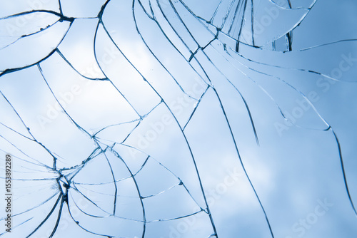 broken glass mirror background with cracks and pieces