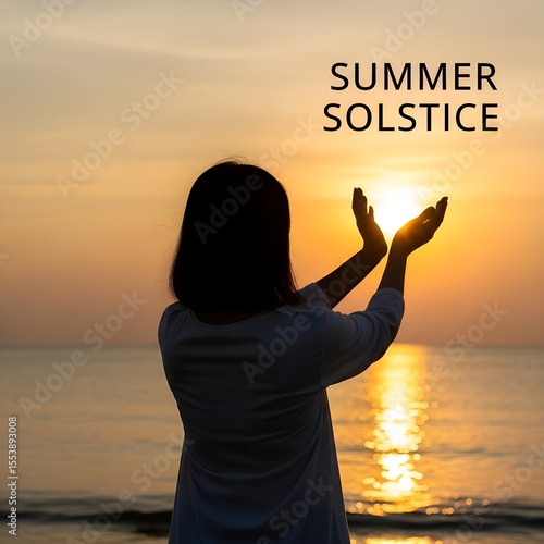Silhouette of a Woman Holding the Sun During Sunset and Celebrating the Summer Solstice on a Peaceful Ocean Coastline