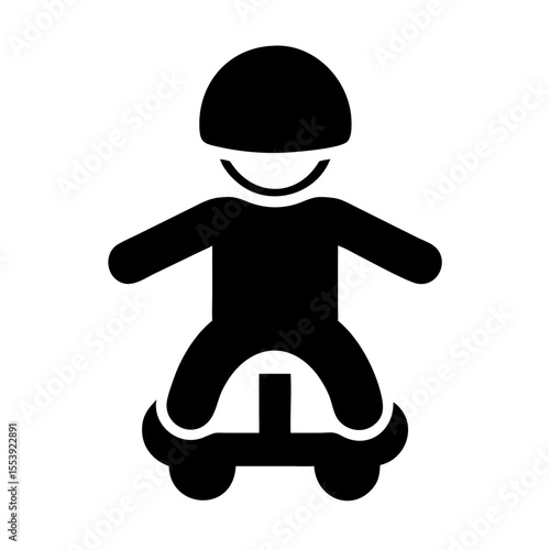 Young Kid Wearing Safety Helmet Enjoys Riding Colorful Skateboard Outdoors