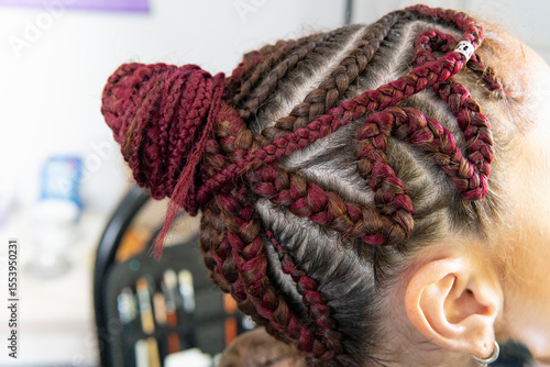 Beautiful braided updo with intricate cornrow patterns
