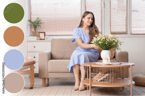 Young woman sitting on sofa...