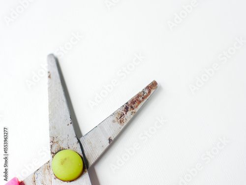 Rusted Scissors on White Background. 