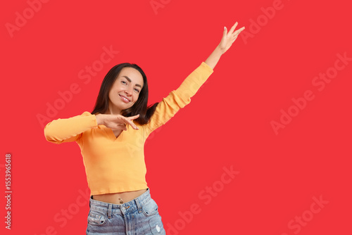 Happy middle-aged woman dan...