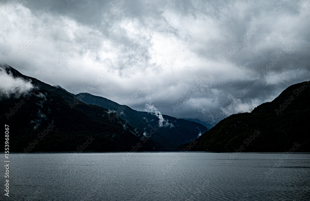Milford sound fiordland new zealand national park beautiful landscape nature fiords low cloud fog dramatic sky iconic Milford sound fiordland new zealand national park beautiful landscape nature fiords low cloud fog dramatic sky iconic