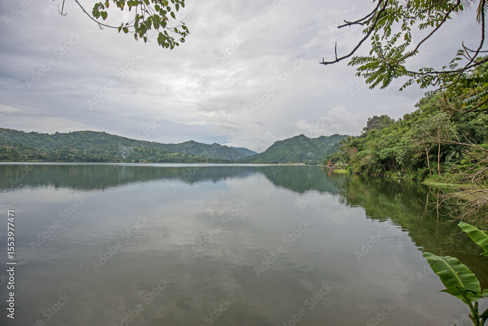 Naklejka premium mountain lake quarry lake idyll with water reflections