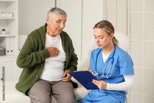 Senior woman visiting nurse...