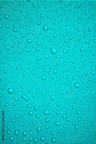Turquoise Surface Adorned with Water Droplets Macro Texture