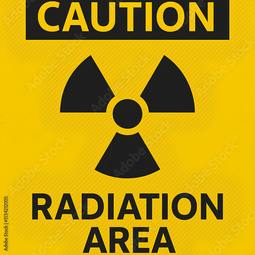 A warning sign with a radiation symbol and the words “CAUTION RADIATION AREA” in bold.