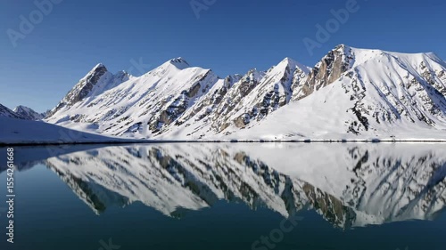 Wallpaper Mural Serene Winter Landscape Snow Covered Mountains Reflecting in a Clear Blue Lake Torontodigital.ca