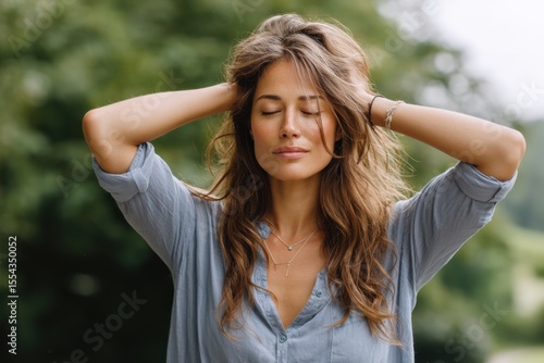 Young woman in outdoor setting finding peace and releasing guilt and shame through self-compassion techniques