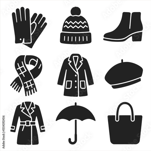 Fall Fashion Icons. Solid, filled icons set of fall fashion accessories: leather gloves, knit hat, ankle boots