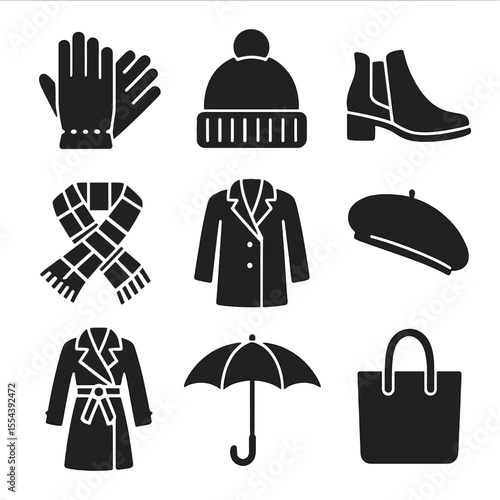 Fall Fashion Icons. Solid, filled icons set of fall fashion accessories: leather gloves, knit hat, ankle boots