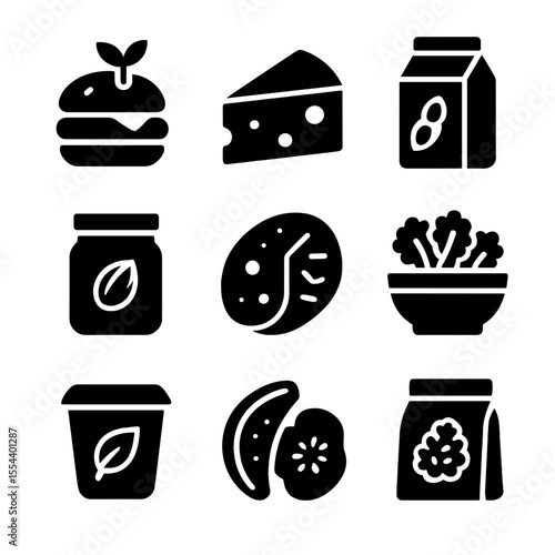 Vegan Food Icons. Solid, filled icons set of vegan grocery items: plant burger, vegan cheese, soy milk, nut