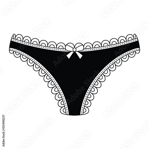 Black thong underwear with lace trim and a bow isolated on white background