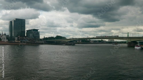 Wallpaper Mural The Rhine River with Deutzer Brucke Bridge and cloudscape in Cologne, Germany. Torontodigital.ca