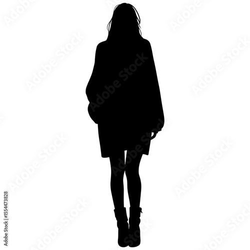 Silhouette of figure in oversized cardigan and boots, cozy fashion layers